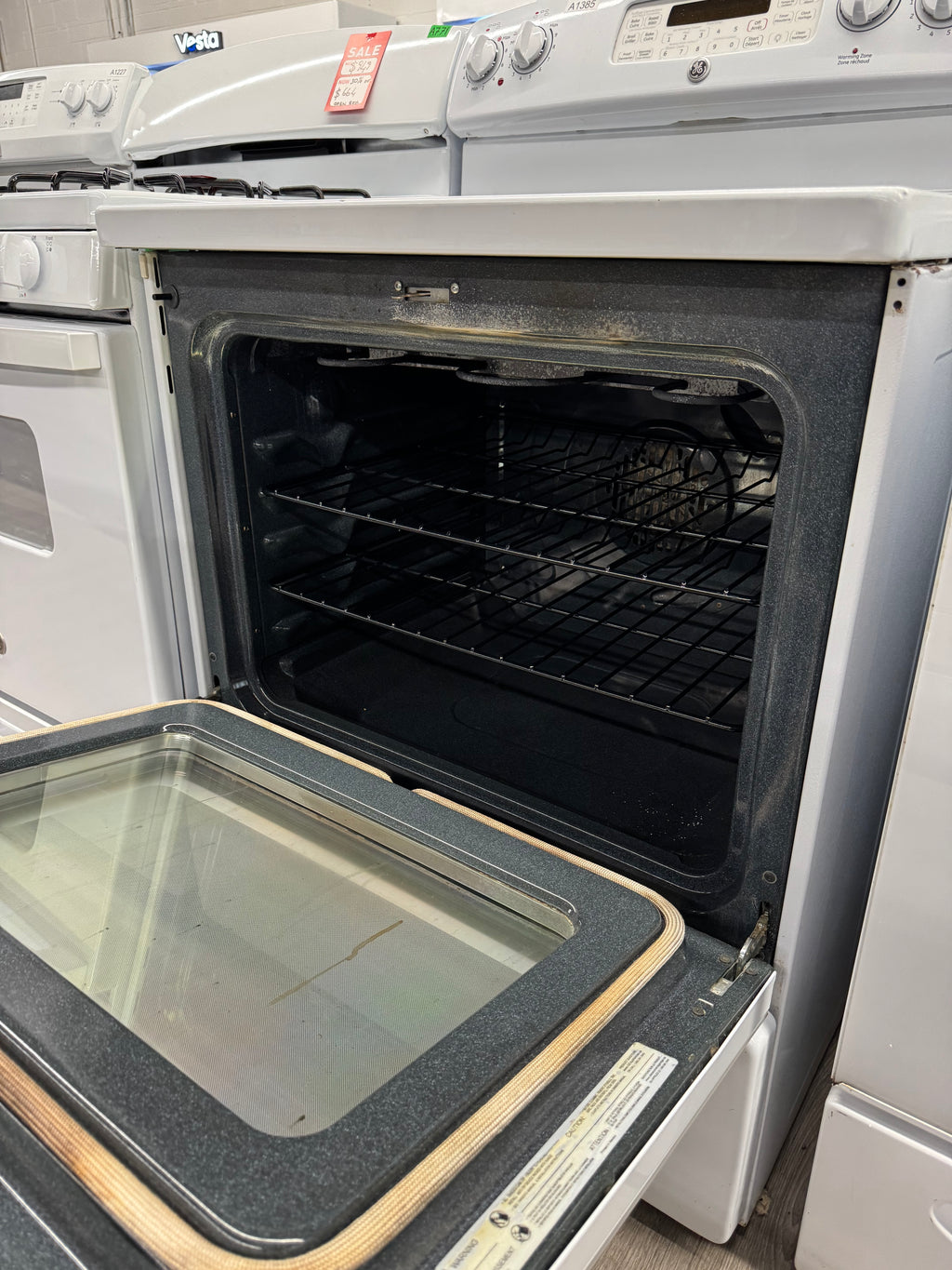 GE 30” Freestanding Glass Top Electric Range - JCBP810DT1WW