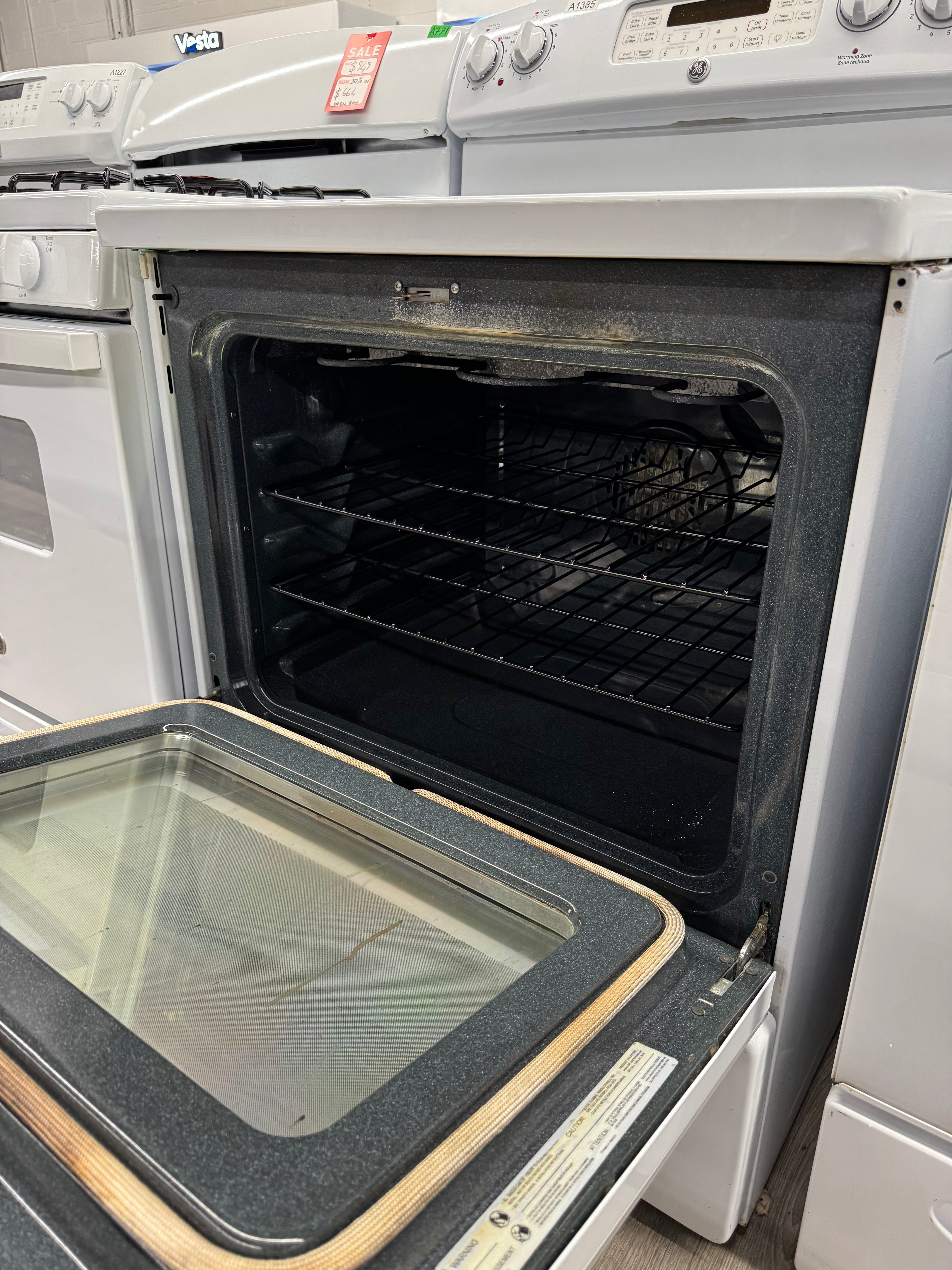 GE 30” Freestanding Glass Top Electric Range - JCBP810DT1WW