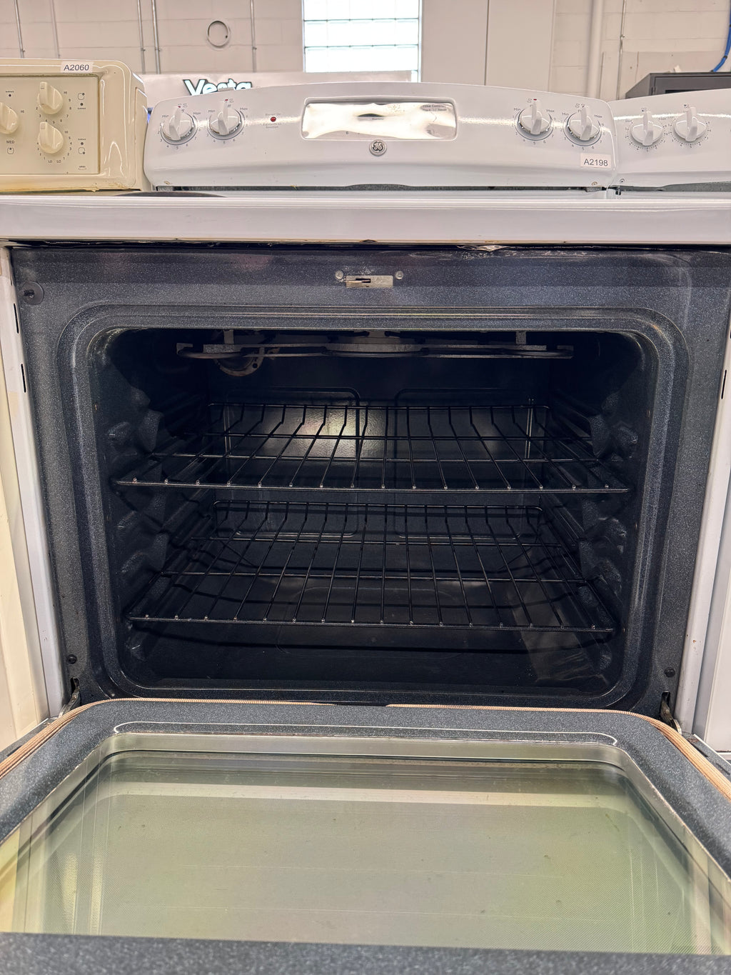 GE 30” Freestanding Coil Top Range - JCBP350DT2WW