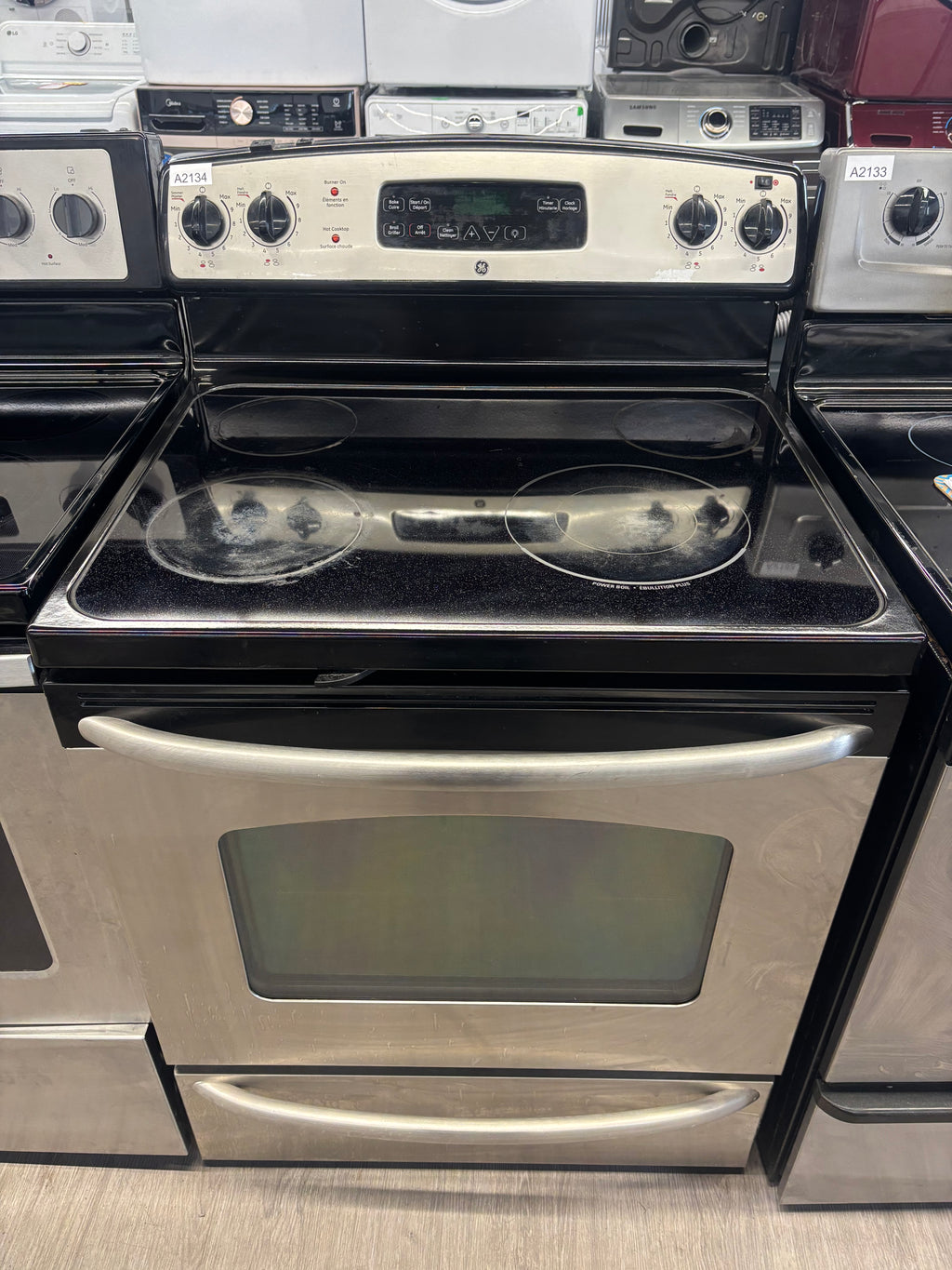 GE 30” Freestanding Glass Top Range - JCBP65SM2SS