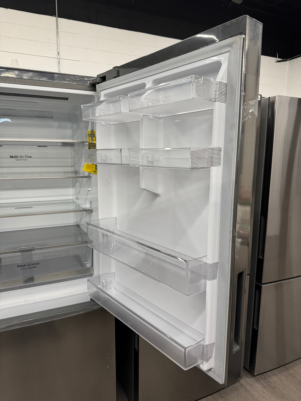 NEW - LG 28” Counter Depth Bottom Freezer Refrigerator - LBNC15251V