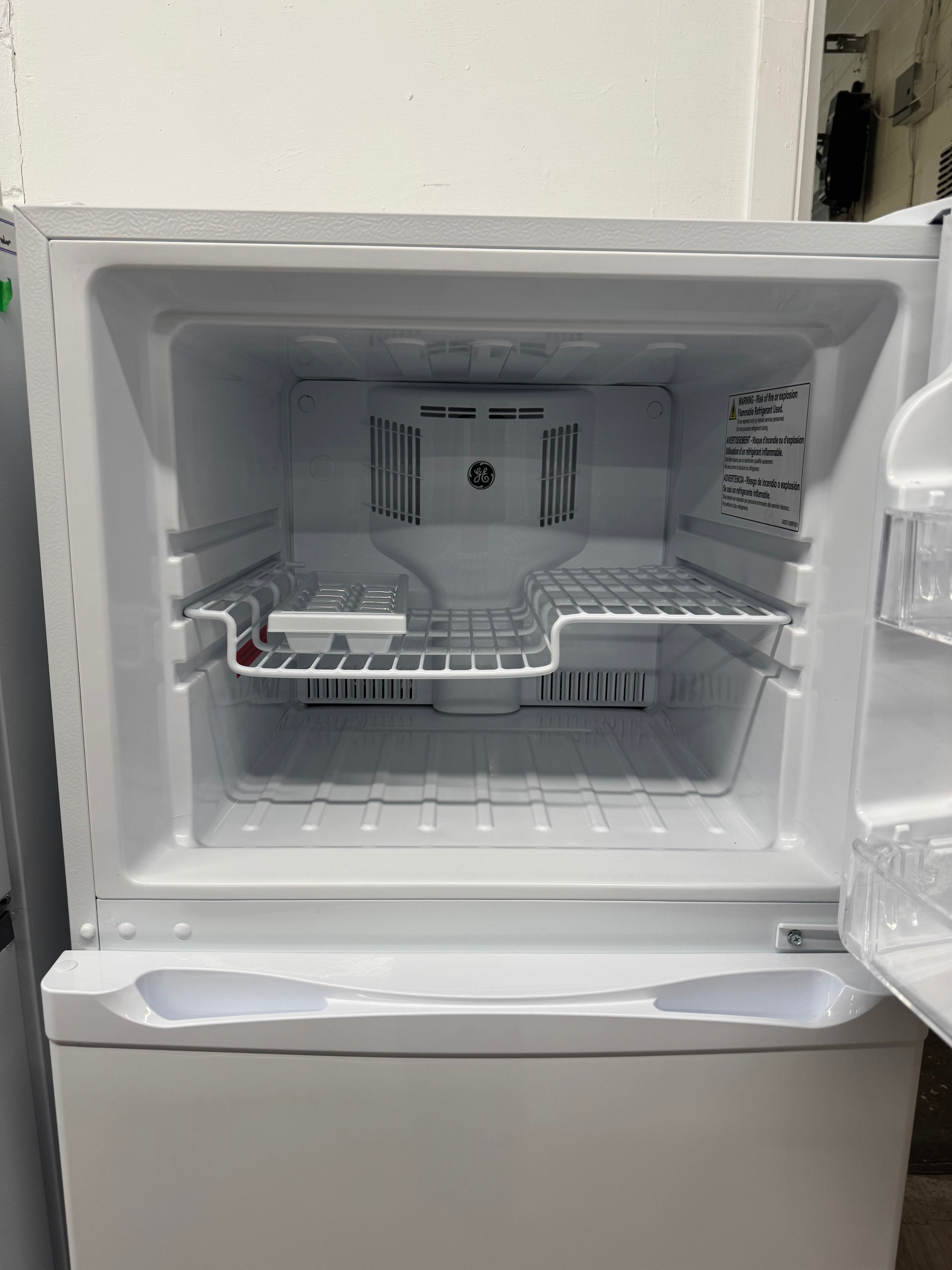 OPEN BOX - GE 24” Top Freezer Refrigerator - GPE12FGWW