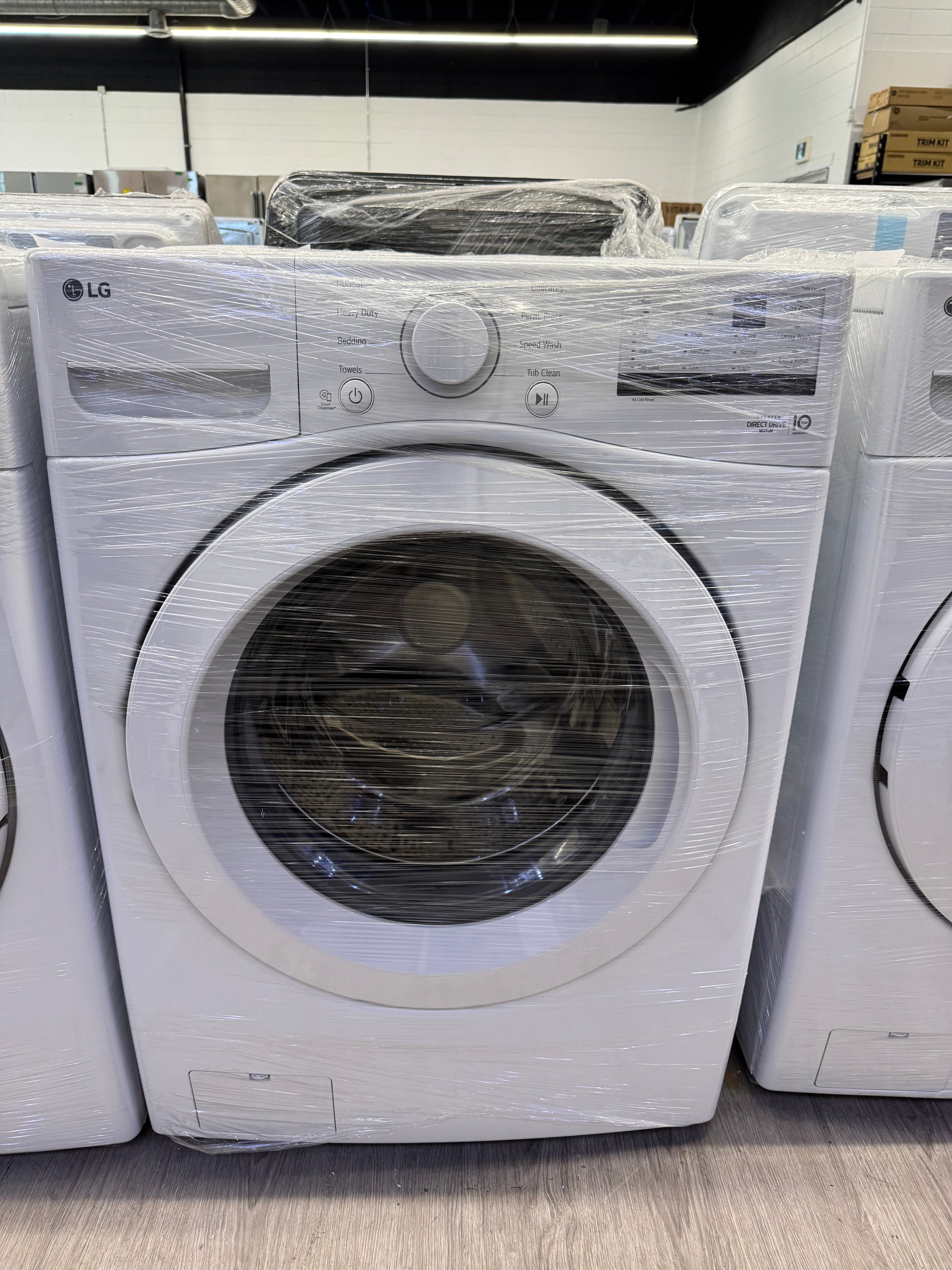 NEW - LG 27” Front Load Washer & Dryer Set (WM3400CW & DLE3400W)