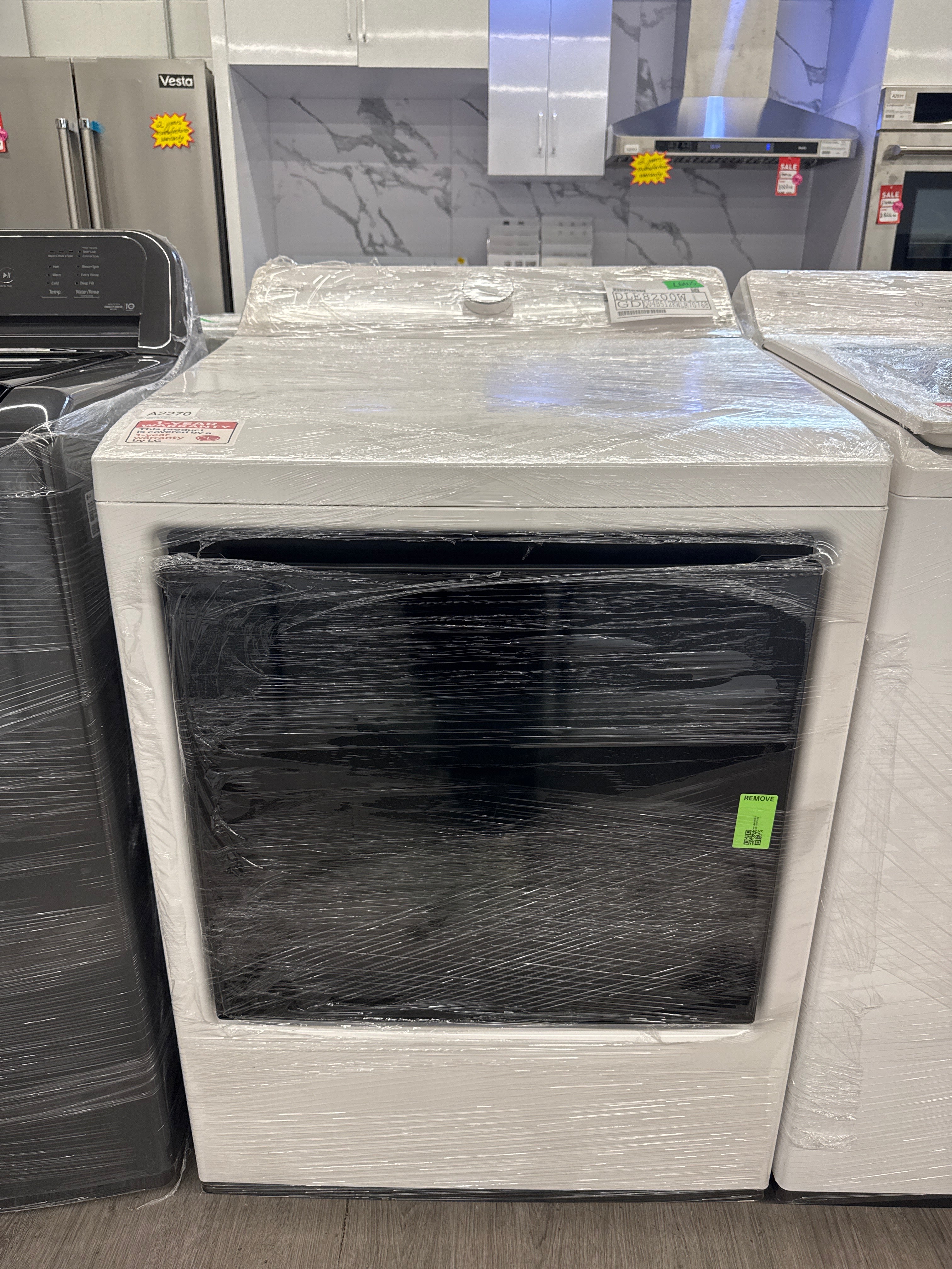 NEW - LG 27” Top Load Washer & Dryer Set (WT8200CW & DLE8200W) 1 YEAR MANUFACTURER WARRANTY)