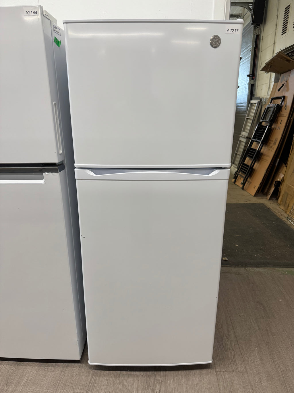 OPEN BOX - GE 24” Top Freezer Refrigerator - GPE12FGWW