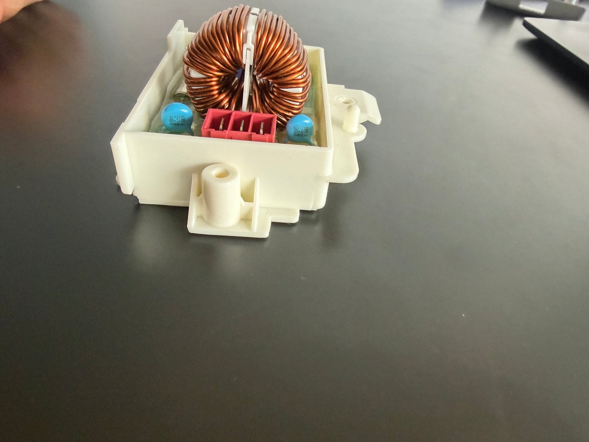 LG EAM60991315 washer noise filter assembly side view