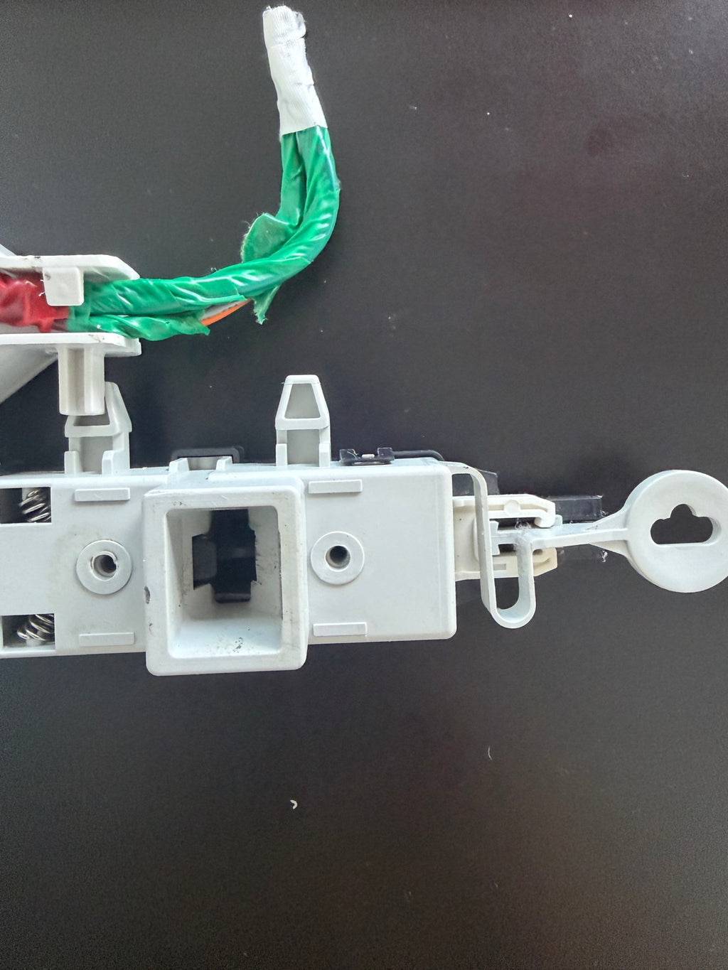 Samsung DC64-00519D washer door lock assembly side view